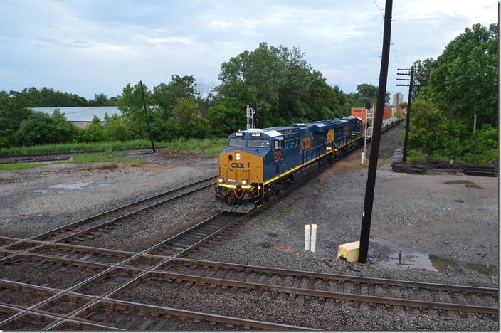 CSX 3229-3237 head Q109 west on the Indianapolis Line with Schneider business from the terminal just east of town. This train makes a round-trip from North Baltimore each day via Ridgeway and Galatea (I think). NS Sandusky District is in the foreground. Marion.